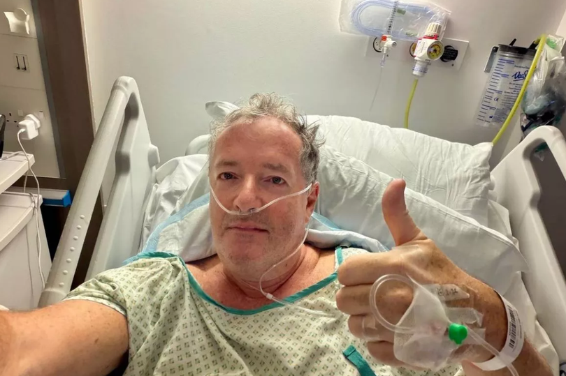 Piers Morgan in hospital bed as he undergoes surgery after tripping at restaurant