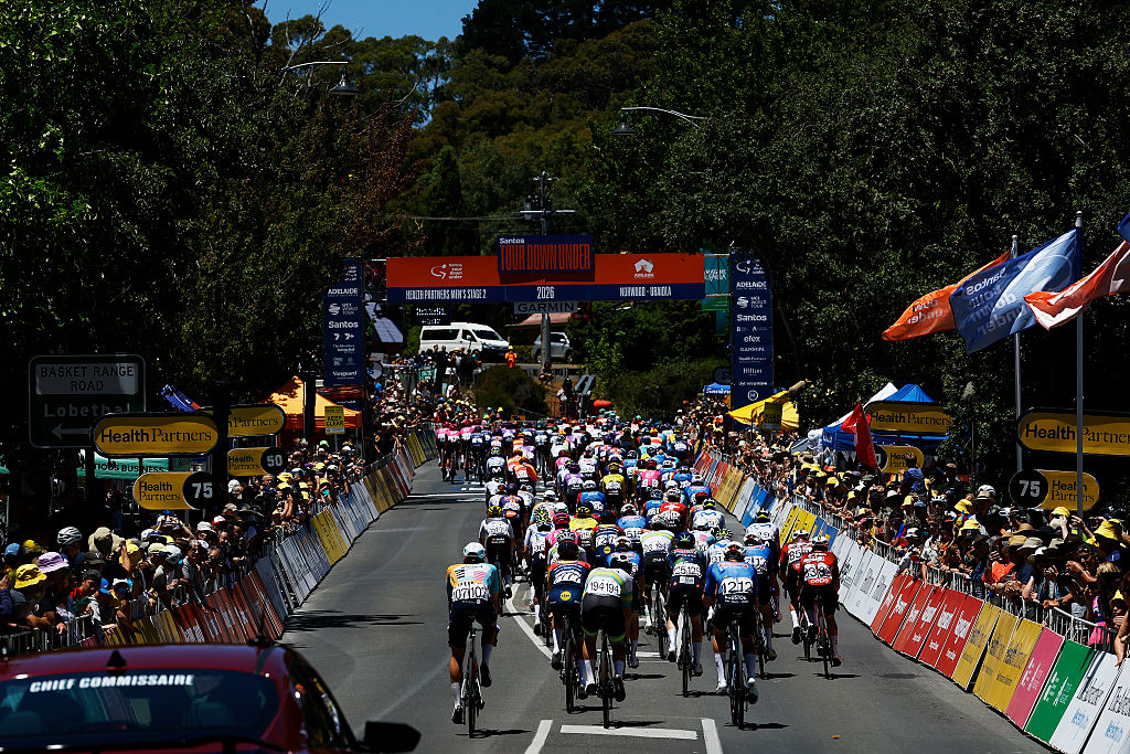 NORWOOD, AUSTRALIA - JANUARY 22: A general view of the peloton competing during the 26th Santos Tour Down Under 2026, Stage 2 a 148.1km stage from Norwood to Uraidla 495m / #UCIWT / on January 22, 2026 in Norwood, Australia. (Photo by Con Chronis/Getty Images)