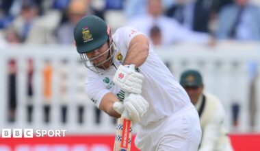 David Bedingham batting for South Africa against Australia at Lord's with his head down over the ball as he pushes it into the onside