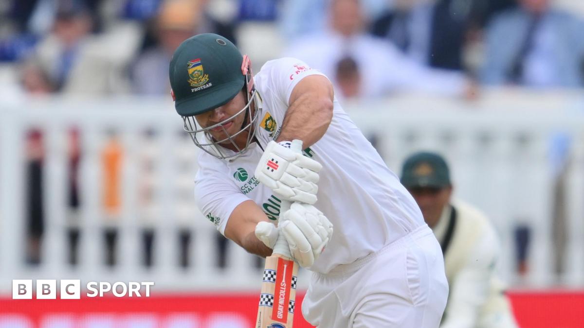 David Bedingham batting for South Africa against Australia at Lord's with his head down over the ball as he pushes it into the onside