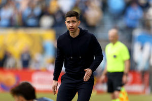 Eric Ramsay in the dugout with Minnesota in 2024. (Photo by Tim Nwachukwu/Getty Images)