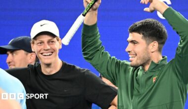 Jannik Sinner and Carlos Alcaraz laugh during the Australian Open's One Point Slam event
