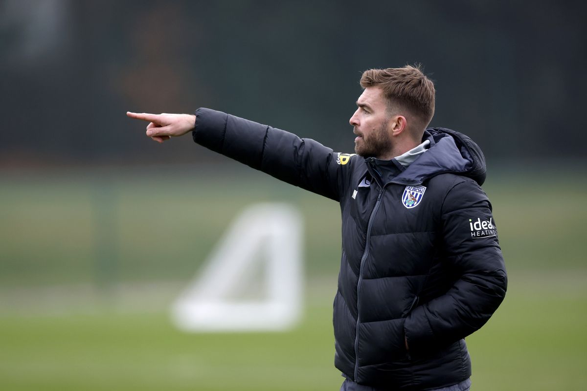 New head coach Ryan Mason, left, watches on with existing staff members James Morrison and Damia Abella. (Photo by Adam Fradgley/West Bromwich Albion FC via Getty Images)