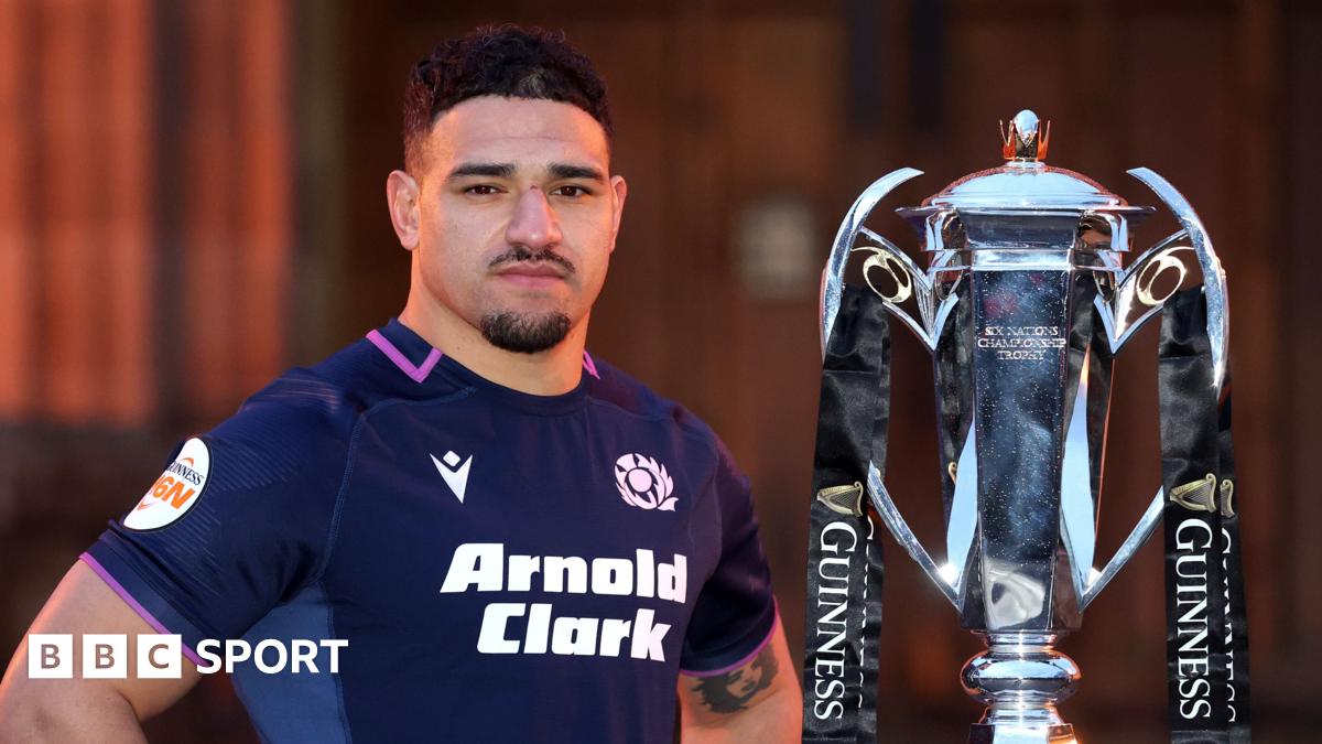 Sione Tuipulotu poses for photographs with the Six Nations trophy during the 2026 Guinness Men's Six Nations Launch Event at Edinburgh Castle