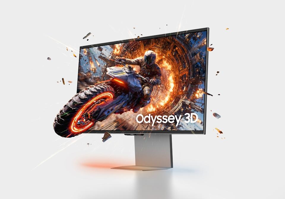 A motorcycle bursting out a of a Samsung Odyssey 3D monitor.