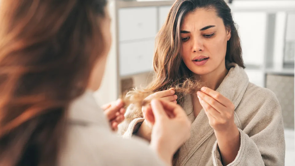 Young woman with hair problems