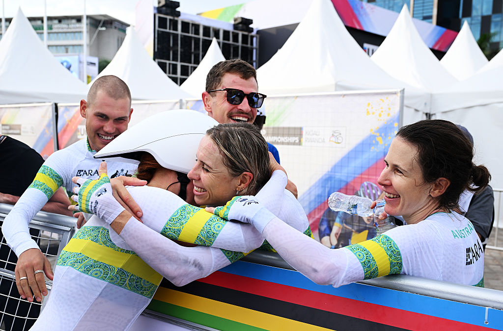 KIGALI, RWANDA - SEPTEMBER 24: Gold medalists Felicity Wilson-Haffenden, Luke Plapp, Jay Vine, Brodie Chapman and Amanda Spratt and Team Australia celebrate winning after the the 98th UCI Cycling World Championships Kigali 2025 - Team Time Trial Mix Relay a 41.8km race from Kigali to Kigali on September 24, 2025 in Kigali, Rwanda. (Photo by Dario Belingheri/Getty Images)