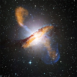 Centaurus A is a famous example of a relatively nearby radio galaxy. Inside the galaxy is a supermassive black hole which is generating the large jets which can be seen emerging perpendicular to the disc of the galaxy. Credit: ESO/WFI (Optical); MPIfR/ESO/APEX/A.Weiss et al. (Submillimetre); NASA/CXC/CfA/R.Kraft et al. (X-ray).