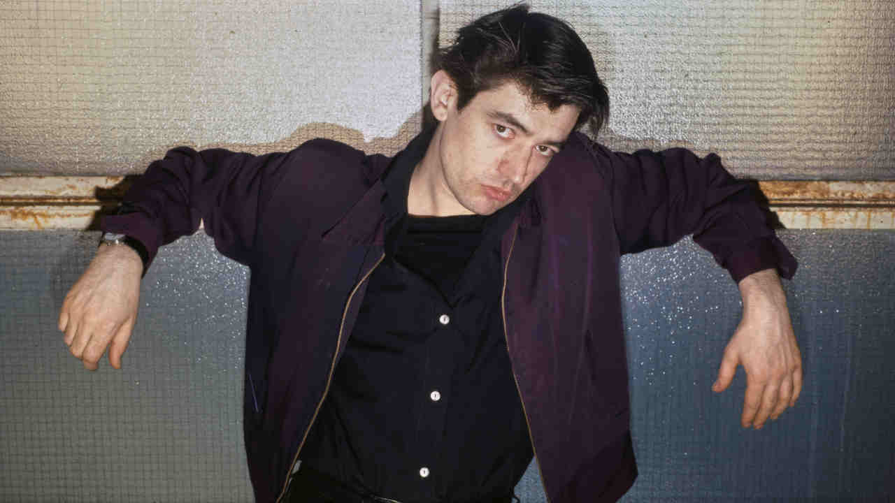 Chris Spedding posing for a photograph in 1982