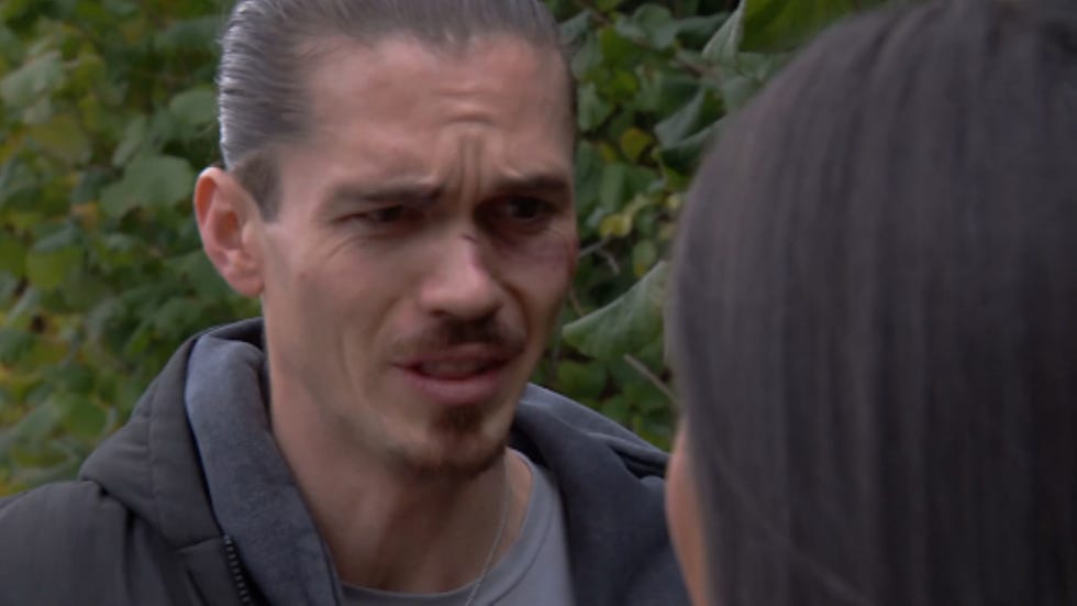 conversation between two individuals in an outdoor setting