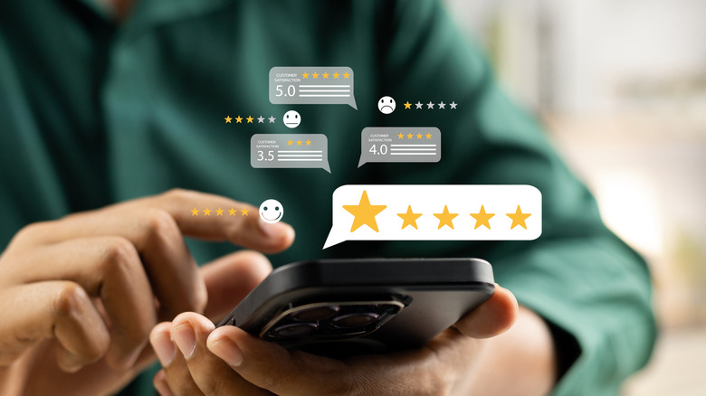 Person holding a phone reviewing items concept