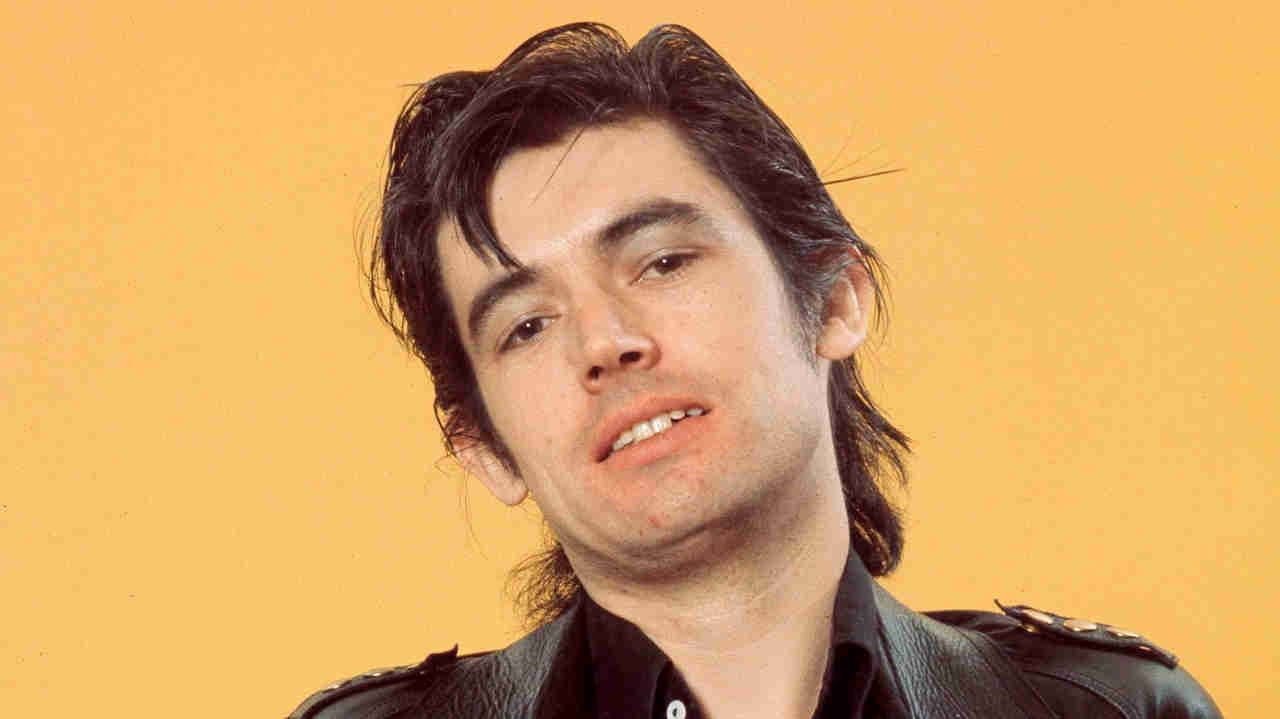 Chris Spedding posing for a photograph in 1975