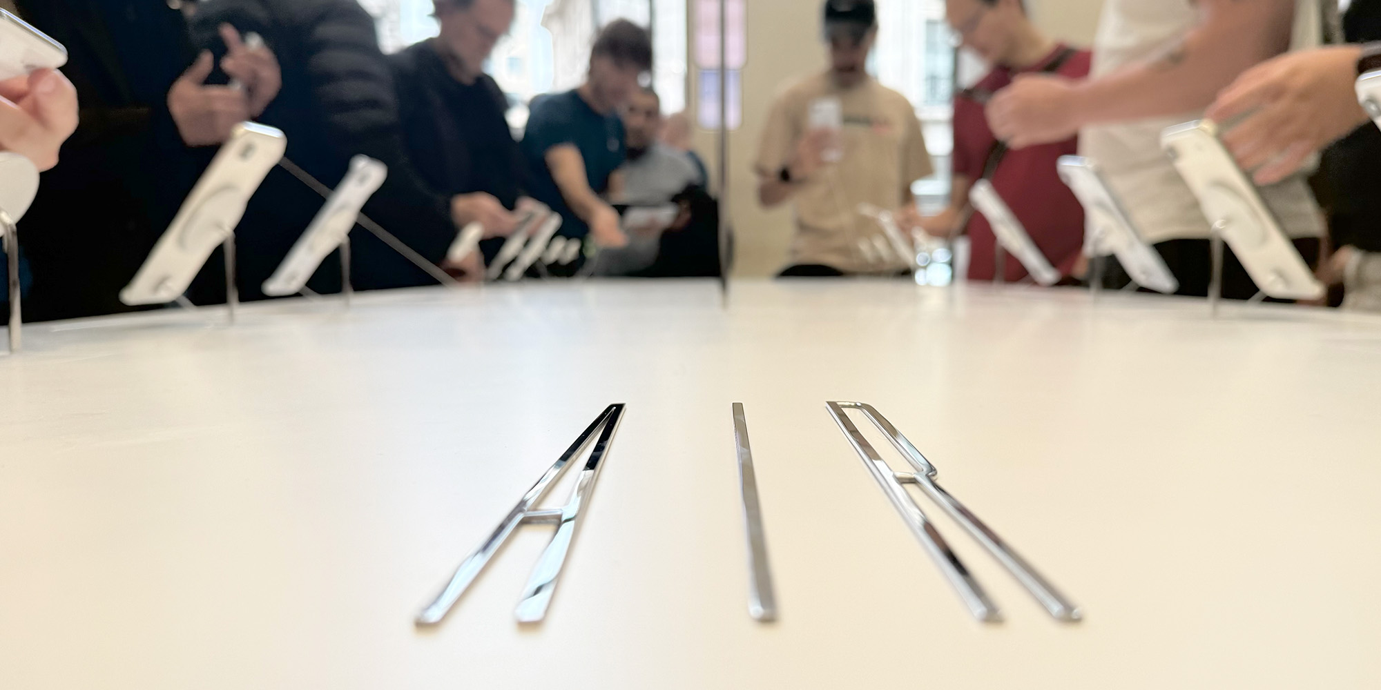 iPhone Air hands-on | In-store demo table with stylized AIR branding