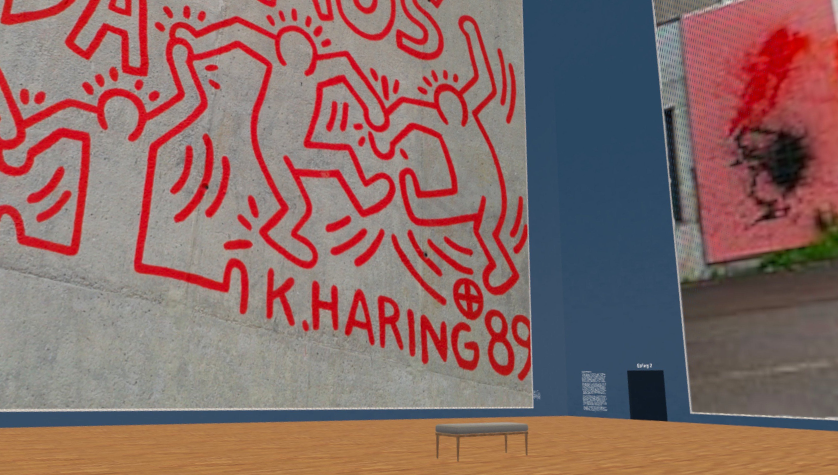 A virtual gallery with a large mural by Keith Haring