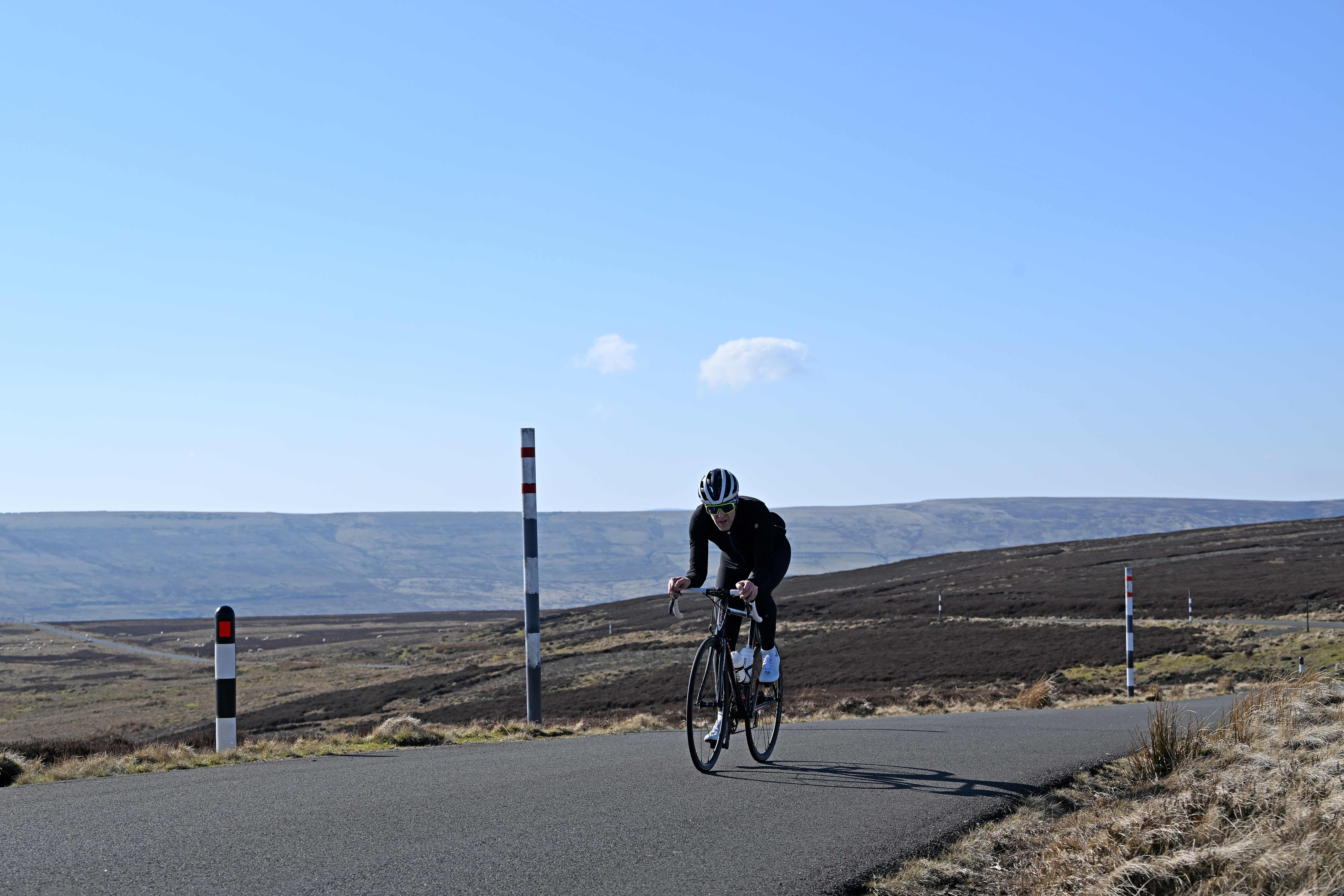 Man cycles on hilltops