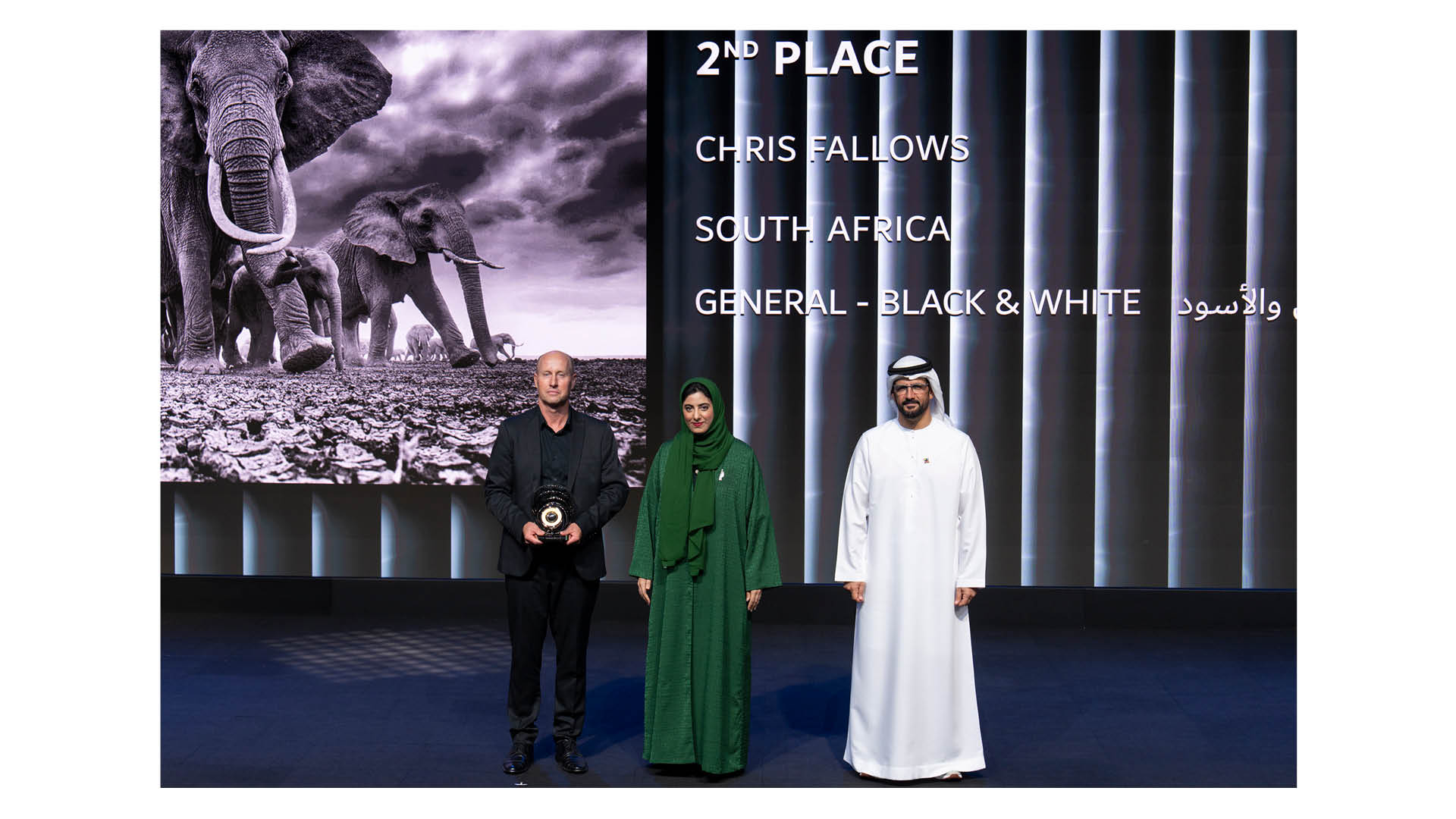South African photographer and conservationist Chris Fallows collecting his trophy for runner-up in the General &ndash; Black &amp; White category of the 14th season of the Hamdan bin Mohammed bin Rashid Al Maktoum International Photography Awards (HIPA)