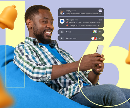 A man on a bean bag chair scrolling his phone with notifications appearing above him.