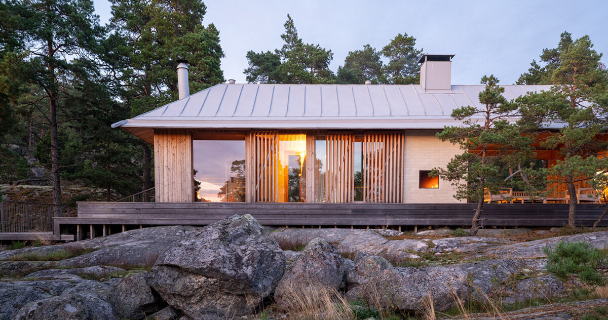 mer architects nods to finnish fishing huts with långholmen island home