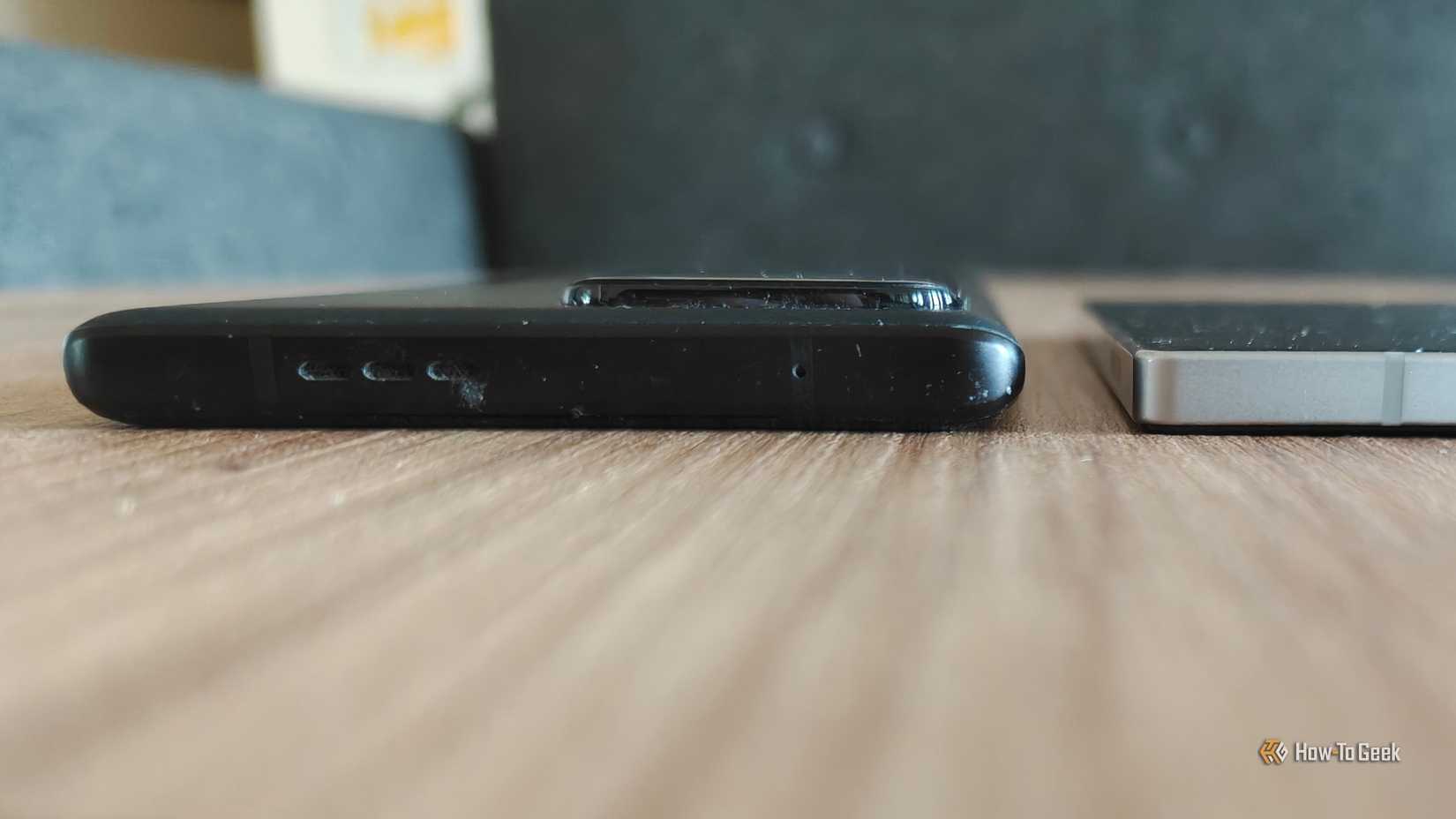 Moto Edge Plus 2023 facedown next to a Samsung Galaxy Z Fold 6.