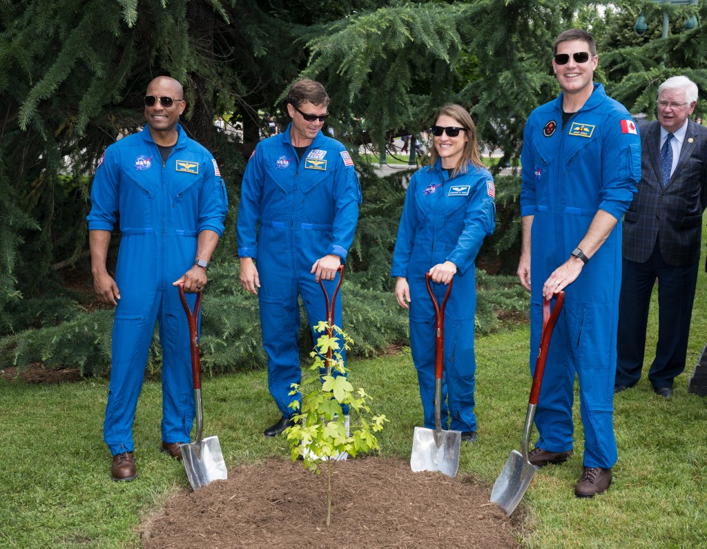 The Artemis II crew, NASA astronauts Victor Glover, Reid Wiseman, and Christina Koch, and Canadian Space Agency (CSA) astronaut Jeremy Hansen, pose for a photo after a Moon tree dedication ceremony, Tuesday, June 4, 2024 at the United States Capitol in Washington. The American Sweetgum tree planted on the southwestern side of the Capitol, was grown from a seed that was flown around the Moon during the Artemis I mission. Photo Credit: (NASA/Aubrey Gemignani)