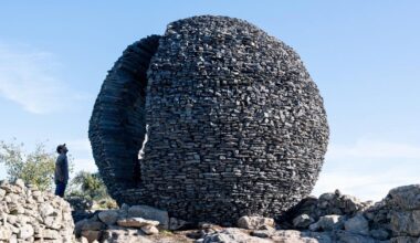 atelier yokyok sculpts sphere out of black schist in portugal