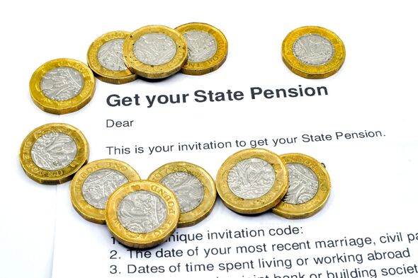 One pound coins on a letter inviting a claim for state pension
