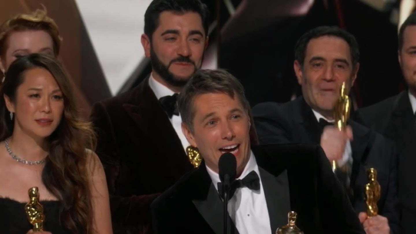 Director and producers of Anora collect Best Picture at 2025 Oscars.