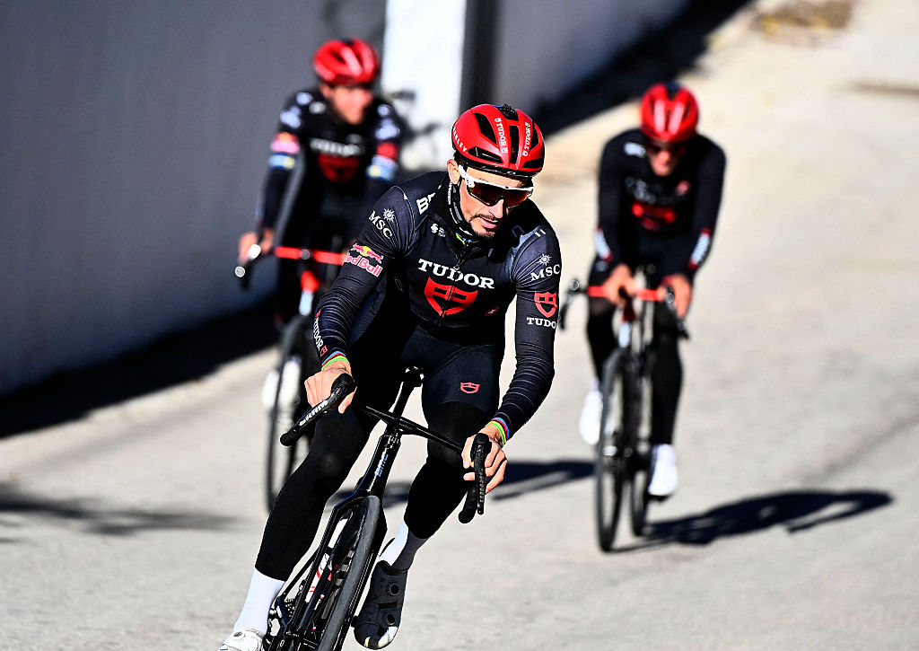 Tudor Pro Cycling Team's French cyclist Julian Alaphilippe rides with teammates before the presentation of the team in Moraira, near Alicante, on January 7, 2026. (Photo by Jose Jordan / AFP)