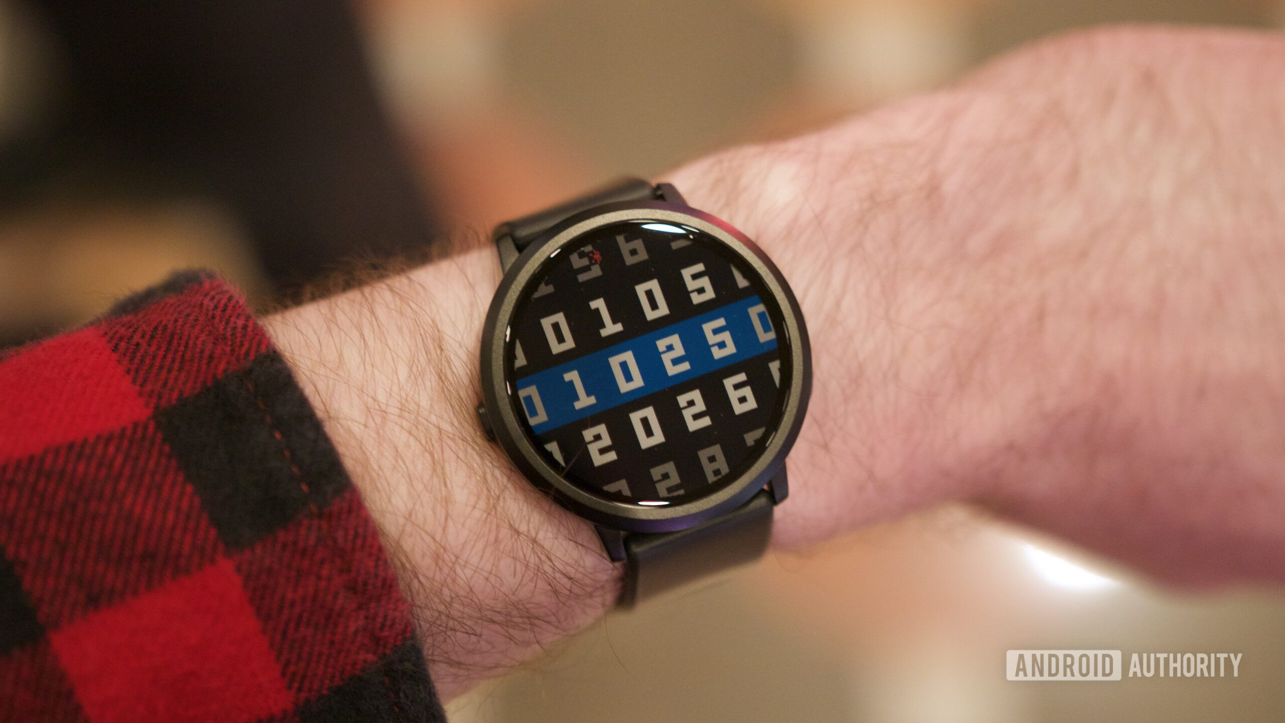 Someone wearing the Pebble Round 2.