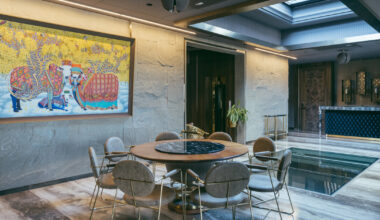 penthouse by metaphors blends neo-classical details with brutalism