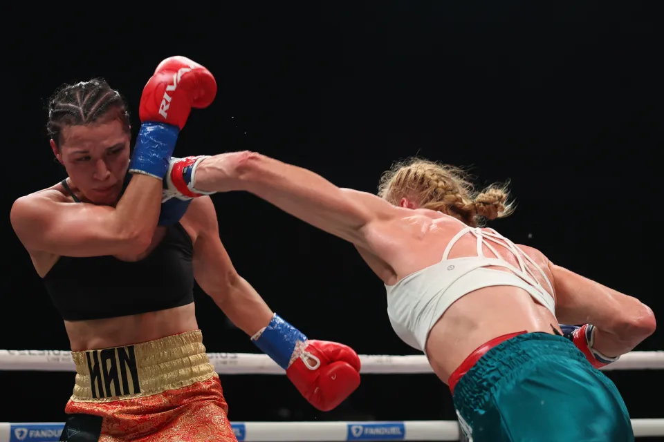 SAN JUAN, PUERTO RICO - JANUARY 03: (R-L) Holly Holm punches Stephanie Han in the WBA World Lightweight Championship bout at Coliseo Roberto Clemente on January 03, 2026 in San Juan, Puerto Rico. (Photo by Ricardo Arduengo/Getty Images)