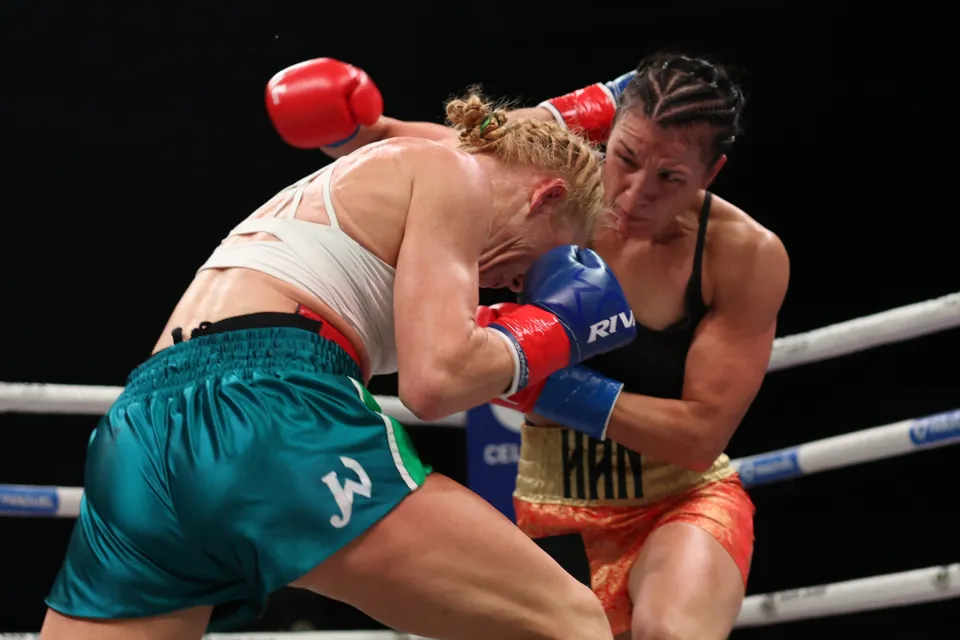 SAN JUAN, PUERTO RICO - JANUARY 03: (R-L) Stephanie Han and Holly Holm trade punches in the WBA World Lightweight Championship bout at Coliseo Roberto Clemente on January 03, 2026 in San Juan, Puerto Rico. (Photo by Ricardo Arduengo/Getty Images)