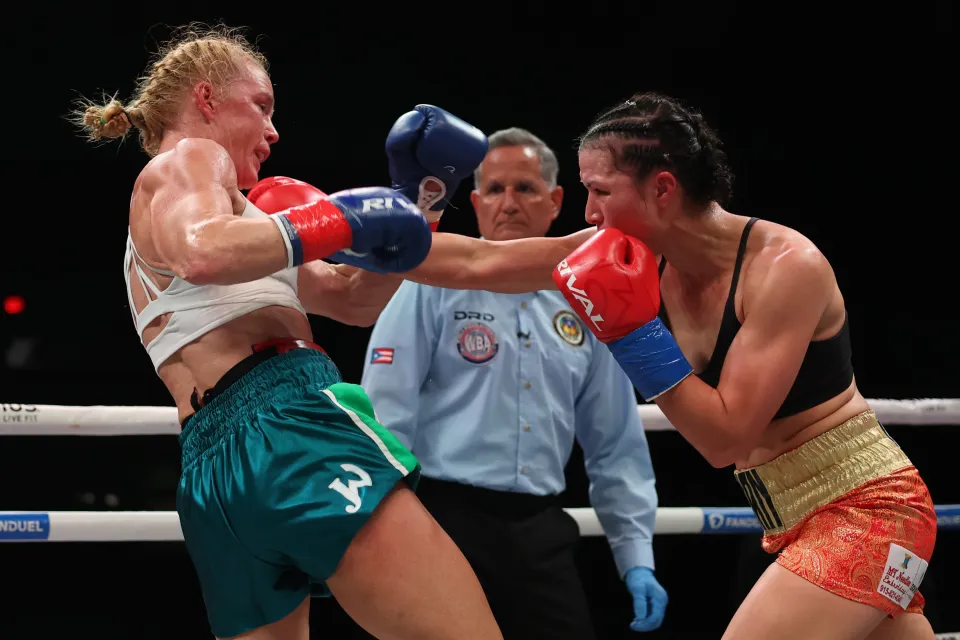 SAN JUAN, PUERTO RICO - JANUARY 03: (R-L) Stephanie Han punches Holly Holm in the WBA World Lightweight Championship bout at Coliseo Roberto Clemente on January 03, 2026 in San Juan, Puerto Rico. (Photo by Ricardo Arduengo/Getty Images)