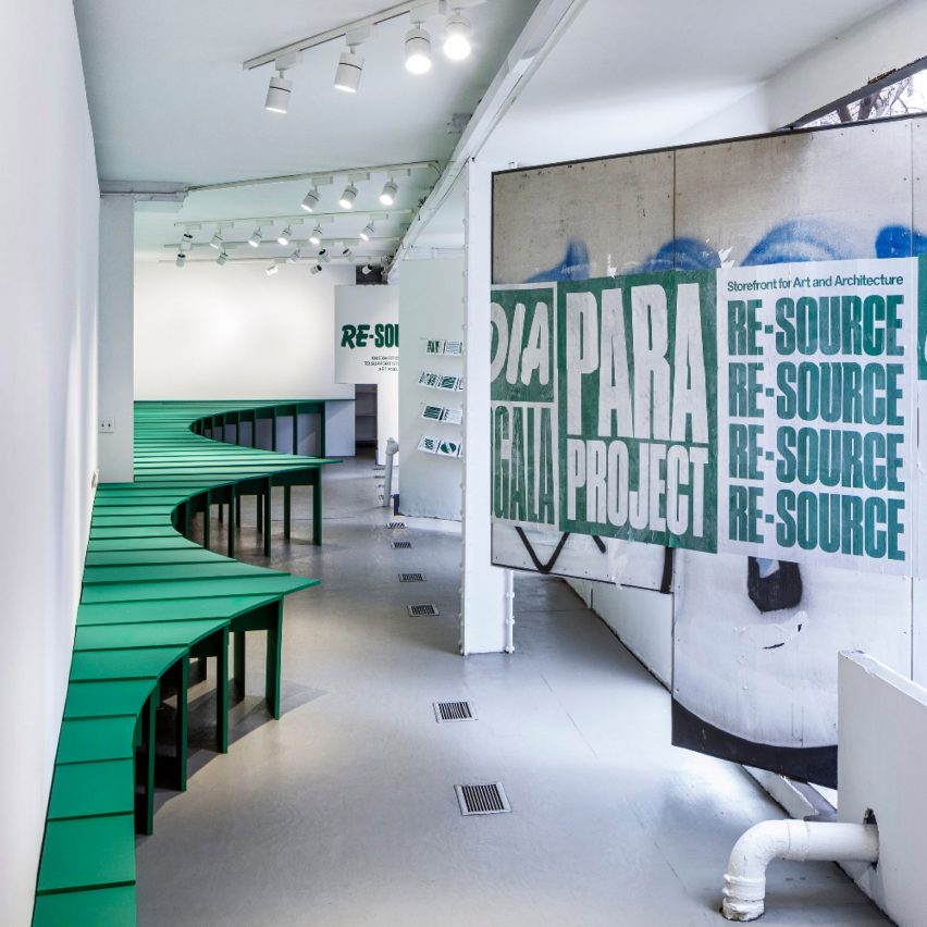 A green bench along the Storefront gallery interior