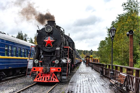 Retro train Ruskeala Express in Ruskeala Park railway station in Karelia, Russia.