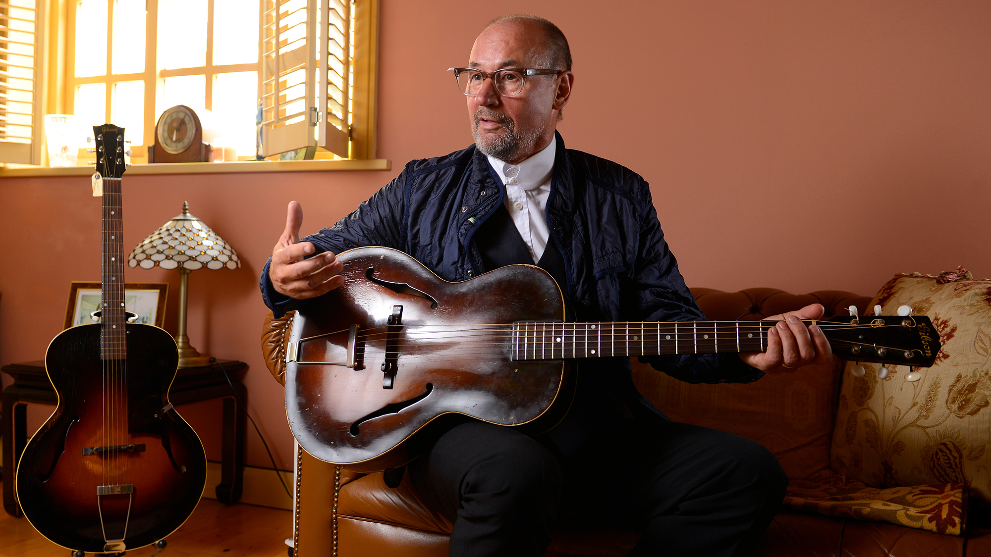 Portrait of Welsh rock musician Andy Fairweather Low photographed at his home in Cardiff, Wales, on August 30, 2013. Low is best known as a member of 1960s rock group Amen Corner, as well as a solo artist and touring guitarist with Roger Waters and Eric Clapton.
