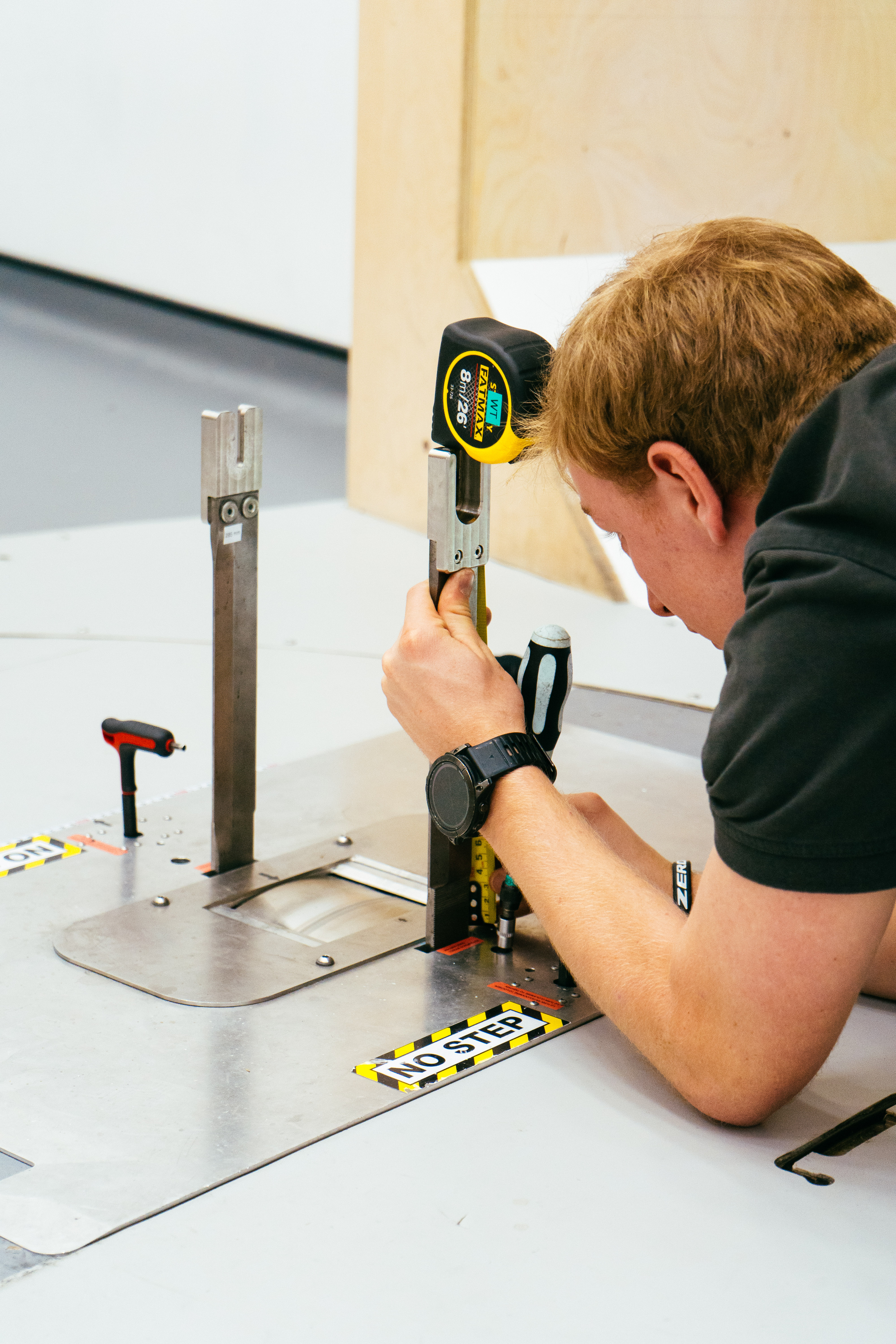 One of the Silverstone engineers setting up the stanchions