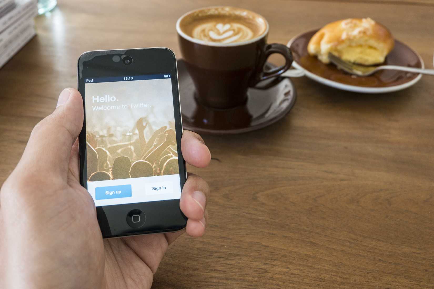 Twitter application login screen on iPod touch apple product device screen.