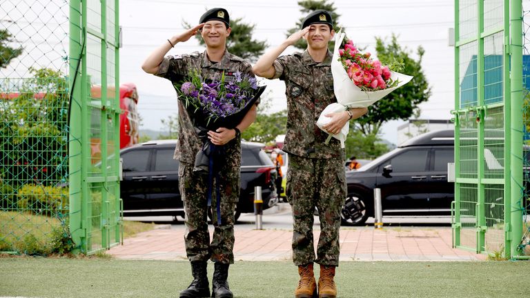 BTS members V and RM after being discharged from military service in June 2025. Pic: Reuters