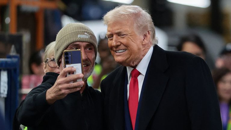 Other workers were much happier to see him. Pic: Reuters