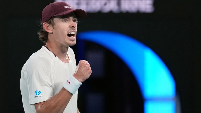 Alex de Minaur of Australia celebrates after defeating Alexander Bublik of Kazakhstan in their fourth round match at the Australian Open ten