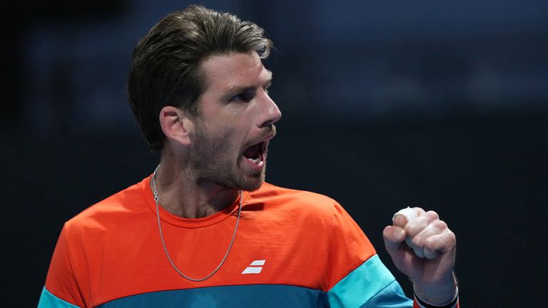 Cameron Norrie of Britain reacts during his second round match against Emilio Nava of the U.S. at the Australian Open tennis championship in Melbourne, Australia, Wednesday, Jan. 21, 2026. (AP Photo/Dar Yasin)