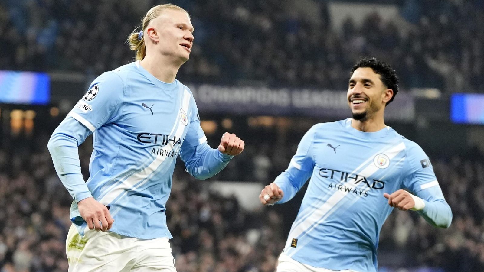 Erling Haaland celebrates with team-mate Omar Marmoush after giving Man City a first-half lead against Galatasaray