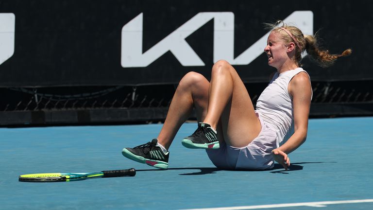 Hollie Smart of Great Britain falls while competing in the Junior Girls' Singles First Round against Azuna Ichioka of Japan during day seve