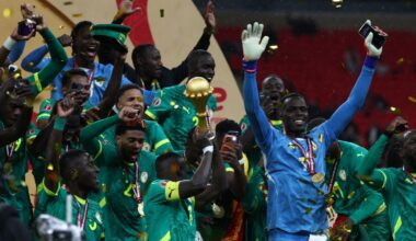 Senegal players celebrate with the trophy after winning the Africa Cup of Nations