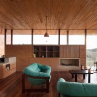 Living room with a rammed-earth wall
