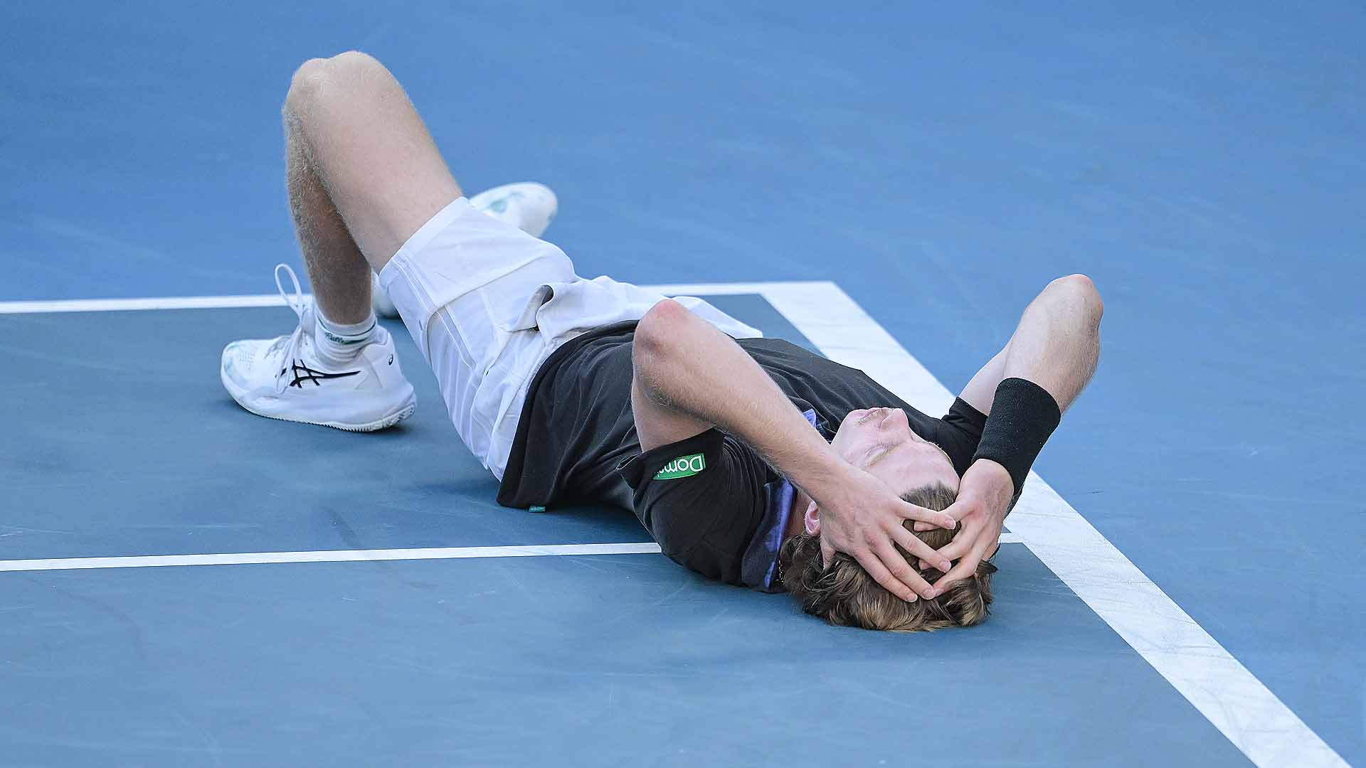 Dane Sweeny celebrates his win against Gael Monfils on Tuesday at the Australian Open.