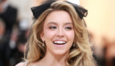 Sydney Sweeney Bares It All in Black Lace Bodysuit and Feather Boots