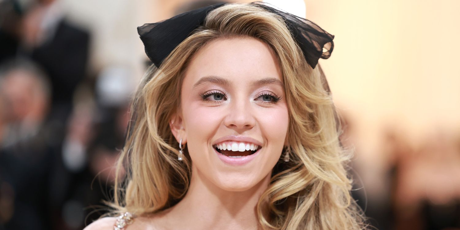 Sydney Sweeney Bares It All in Black Lace Bodysuit and Feather Boots