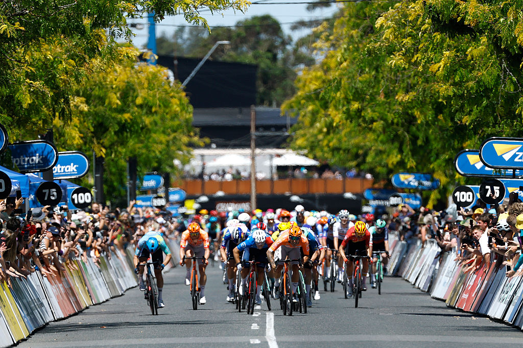 NAIRNE, AUSTRALIA - JANUARY 23: (L-R) Aaron Gate of New Zealand and XDS Astana Team, Lewis Bower of New Zealand and Team Groupama - FDJ United and stage winner Sam Welsford of Australia and Team INEOS Grenadiers sprint at finish line during the 26th Santos Tour Down Under 2026, Stage 3 a 140.8km stage from Henley Beach to Nairne / #UCIWT / on January 23, 2026 in Nairne, Australia. (Photo by Con Chronis/Getty Images)